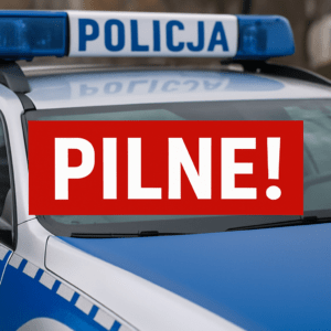 Napis Pilne na tle policyjnego radiowozu